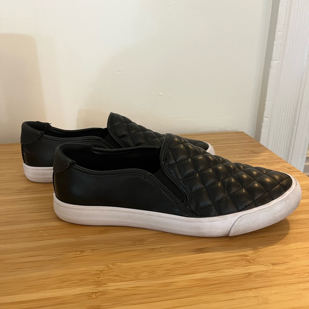 Black slip on sneakers